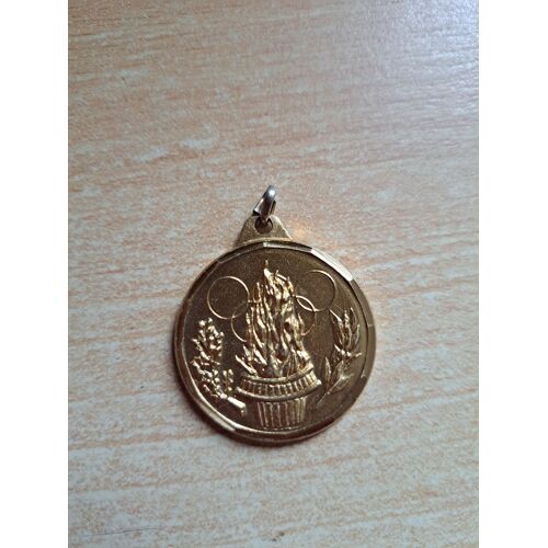 Médaille Des J.O. En Métal Doré