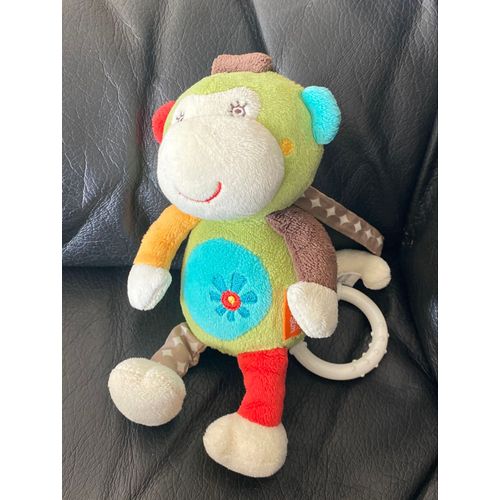 PELUCHE MUSICALE SINGE BABYSUN VERT ROUGE FLEUR 18 CM