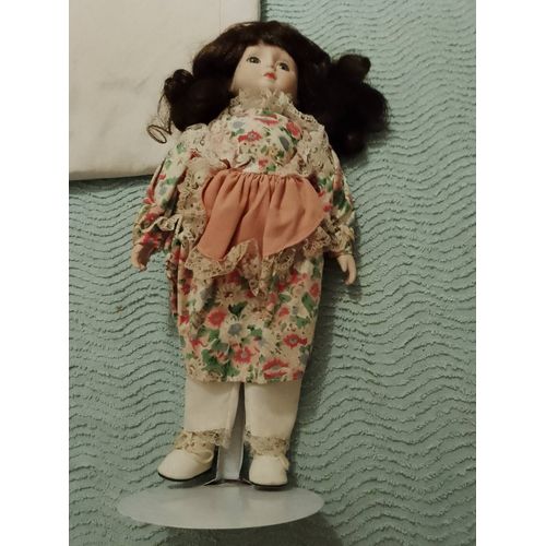 Poupée en porcelaine colorée vintage années 50.