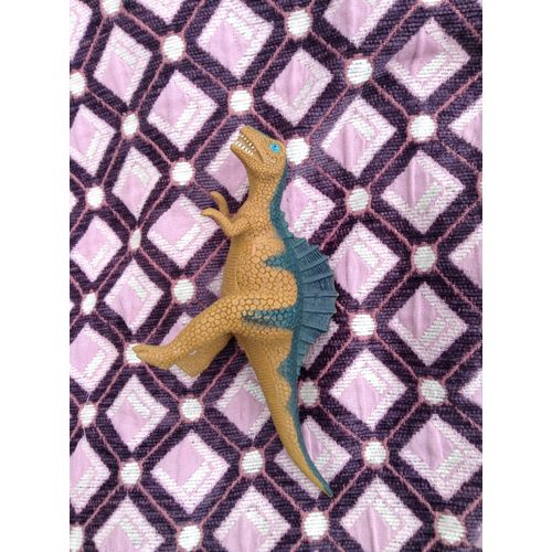 Dinosaure marron et vert en figurine
