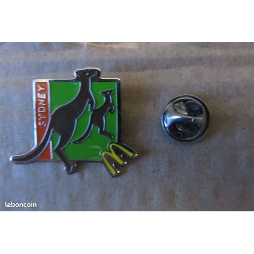 Pin'S Mac Donald'S Monde Signé Arthus Bertrand