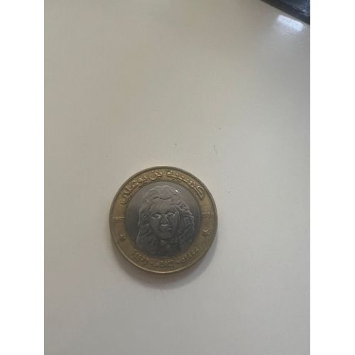 Pièce Bimétallique Marocaine De 50 Centimes, Avec Un Centre En Argent Et Un Pourtour En Or. La Valeur « 50 » Est Bien Visible À L'Avers, Avec Des Inscriptions Arabes.