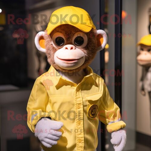 Mascotte Redbrokoly De Personnage De Singe Jaune Habillé D'une Chemise Oxford Et De Bonnets