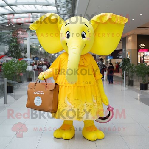 Personnage De Costume De Mascotte Redbrokoly D'éléphant Jaune Citron Habillé D'une Robe Et De Pochettes