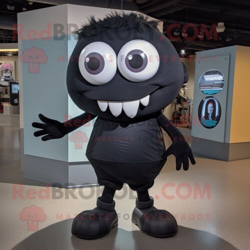 Mascotte Redbrokoly De Personnage De Cyclope Noir Habillé D'une Chemise En Popeline Et De Lacets