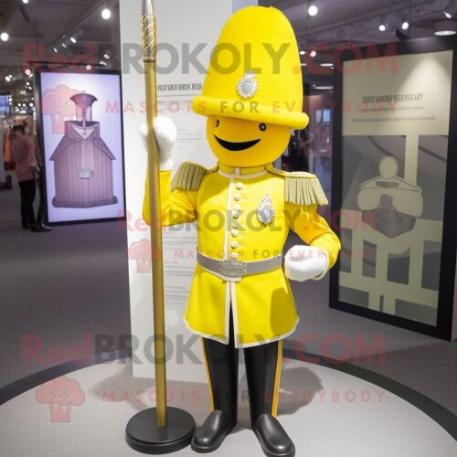 Personnage De Costume De Mascotte Redbrokoly De La Garde Royale Britannique Jaune Citron Habillé D'un Pull Et D'épingles À Chapeau