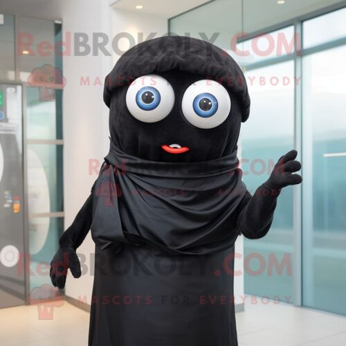 Mascotte Redbrokoly De Personnage De Cyclope Noir Habillé D'un Chemisier Et D'une Écharpe À Pinces