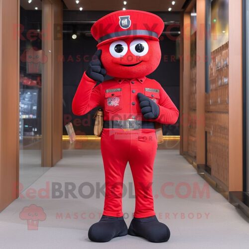 Mascotte Redbrokoly De Personnage De Commando Rouge Habillé D'un Jean Flare Et De Pochettes