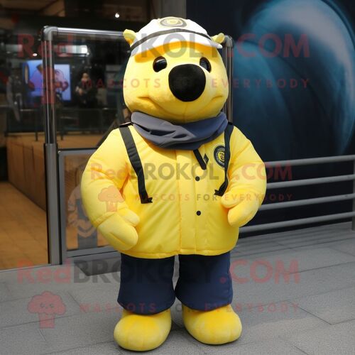 Personnage De Costume De Mascotte Redbrokoly De Phoque Bleu Marine Jaune Citron Habillé D'un Blouson Aviateur Et De Lacets De Chaussures