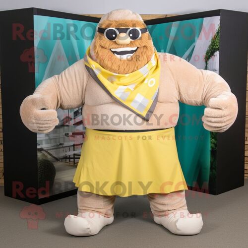 Mascotte Redbrokoly De Personnage De Strongman Beige Habillé D'une Barboteuse Et D'écharpes