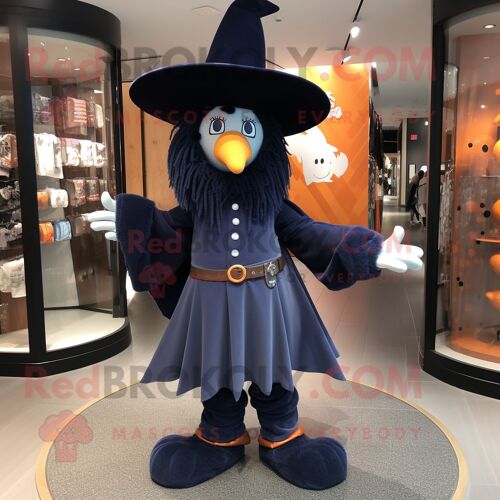 Mascotte Redbrokoly De Chapeau De Sorcière Bleu Marine Habillée D'un Jean Bootcut Et D'épinglettes