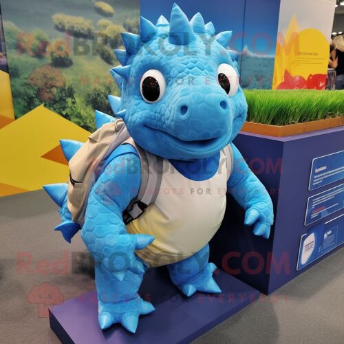 Personnage De Costume De Mascotte Redbrokoly D'ankylosaurus Bleu Habillé D'un Chemisier Et De Sacs À Dos