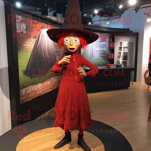 Mascotte Redbrokoly De Chapeau De Sorcière Rouge Habillée D'une Chemise Oxford Et De Bretelles