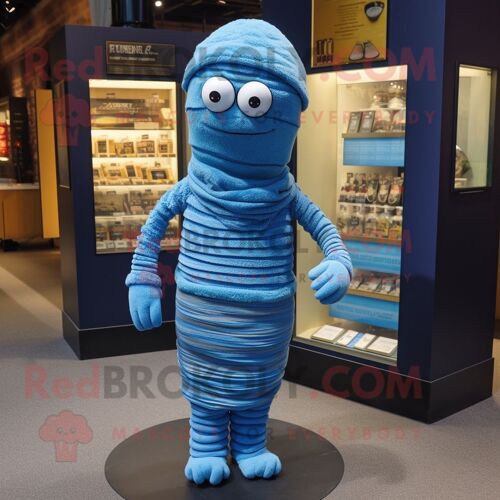 Mascotte Redbrokoly De Personnage De Momie Bleue Habillée D'un Cardigan Et De Cummerbunds