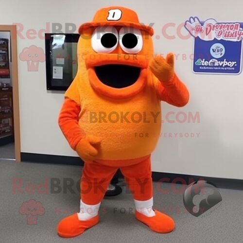Personnage De Costume De Mascotte Redbrokoly De Montre-Bracelet Orange Habillé D'un Pantalon En Velours Côtelé Et De Coussinets Pour Les Pi