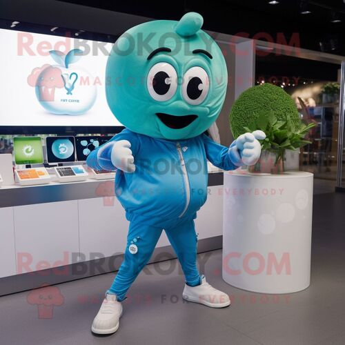 Mascotte Redbrokoly De Personnage De Pomme Turquoise Habillée D'un Pantacourt Et De Montres Digitales