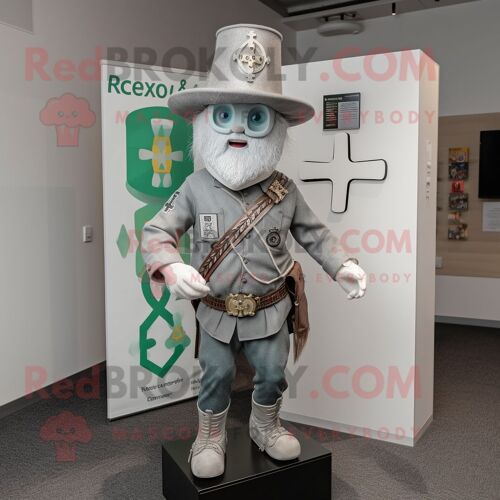 Costume De Mascotte Redbrokoly De Croix Celtique Argentée Habillée D'un Jean Skinny Et D'épingles À Chapeau