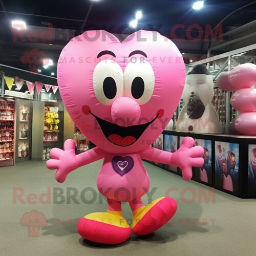 Personnage De Costume De Mascotte Redbrokoly De Ballons En Forme De Coeur Rose Habillé Avec Un Débardeur Et Des Lacets De Chaussures