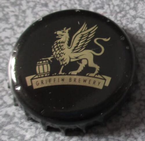 Capsule De Bière Anglaise Fuller's Avec Le Griffon Doré Emblème De La Brasserie Depuis 1816 Sur Fond Noir- Griffin Brewery