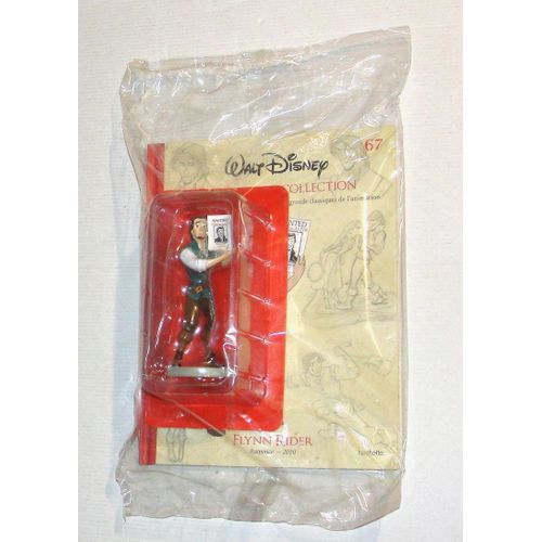 flynn rider dans raiponce figurine collection Disney  + son livre n°67 sur l'histoire et les secrets de fabrication du personnage du film raiponce Disney