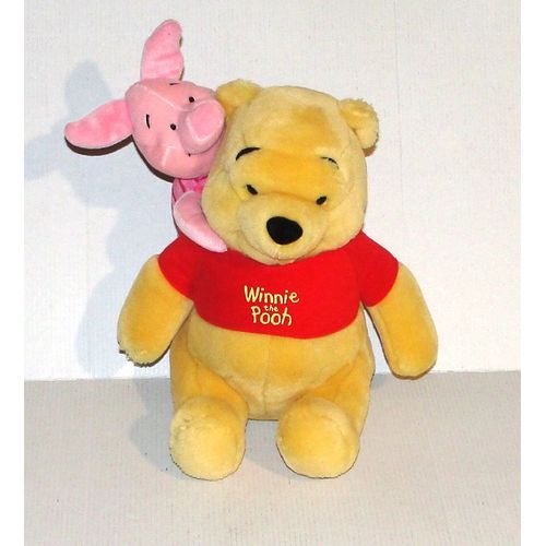 peluche winnie l'ourson et porcinet sur son dos disney