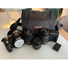 PENTAX K-50 16 mpix Noir + Objectif 18-55 + Objectif 50-200 + Objectif 50 mm F1.4 + filtres UV 52mm x2 + filtre UV 49mm + Chargeurs et batteries x2 + Sac fourre tout pour reflex PENTAX