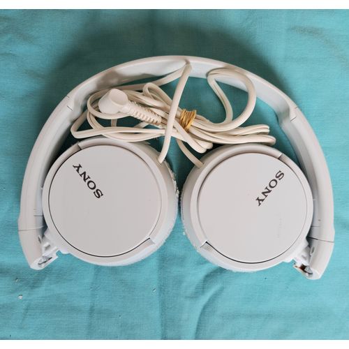 casque SONY blanc pliable + housse de rangement fonctionne parfaitement bien - tissu craquelé - Envoi très RAPIDE et SOIGNE.