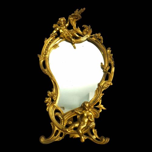 Miroir ancien en bronze style Louis XV dcor de putti dore