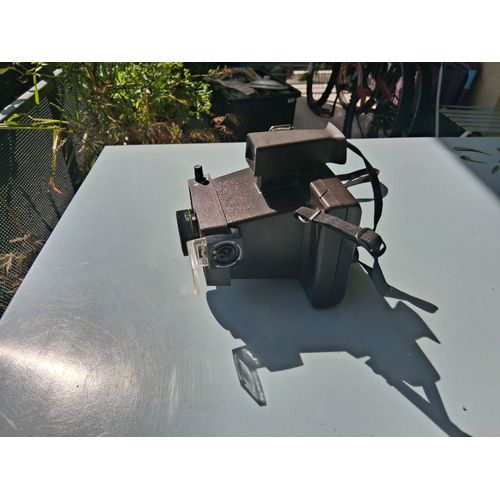Polaroïd de 1977 avec 2 flashCubes et notice