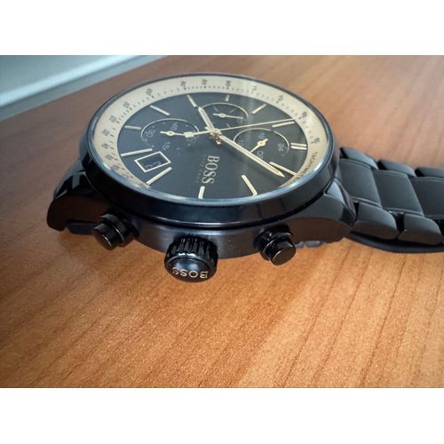 Montre Hugo Boss  Sport + Coffret Réf 1513578 Bracelets Noir Inoxydable Cadran Noir Contour Doré Chrono Tachymètre