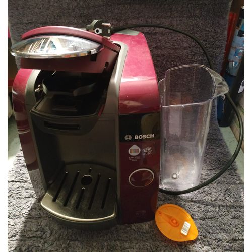 Machine TASSIMO de BOSCH TAS 4301/01 muti-boissons café, thé, chocolat chaud - couleur bordeaux foncé - sans l'emballage mais avec le disque orange pour le nettoyage