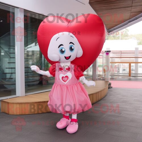 Mascotte Redbrokoly De Personnage De Coeur Rose Habillé D'un Chemisier Et De Repose-Pieds