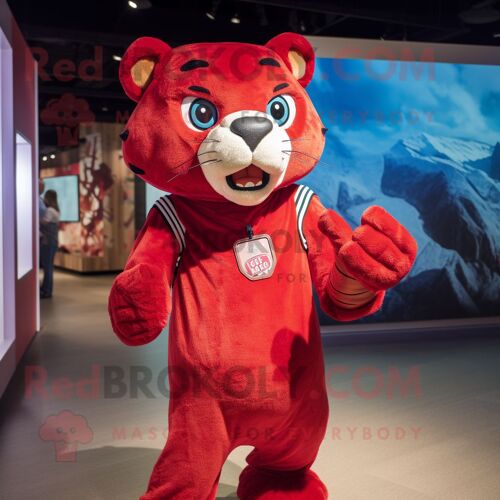 Mascotte Redbrokoly De Personnage Jaguar Rouge Habillé Avec Un Mom Jeans Et Des Montres Digitales