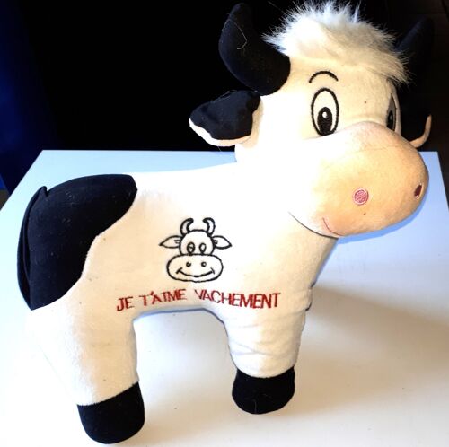Peluche Rigolote En Forme D'une Petite Vache À L'expression Espiègle-Blanche/Noire/Rose-Inscription Je T'aime Vachement- 25x36x17cm Environ - Tient Debout Sur Ses Pattes - Produit B & G International