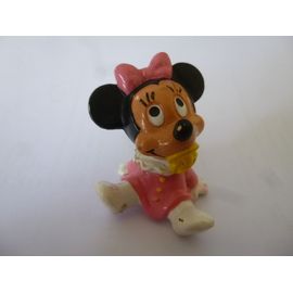 une figurine bébé minnie, assise , avec une tetine, 1985