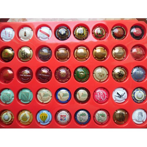 Lot De 40 Capsules De Champagne.