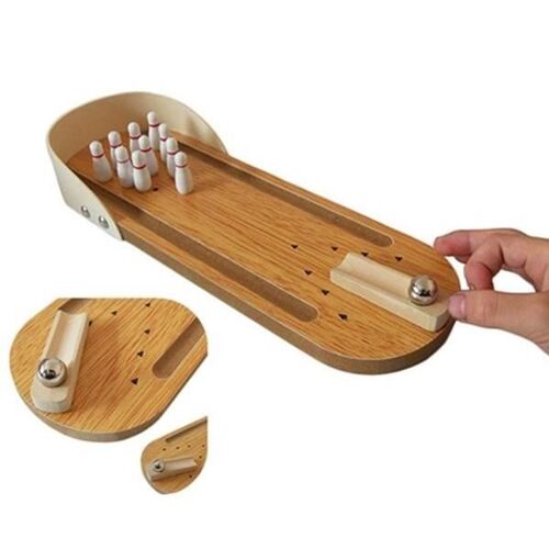 Bowling miniature en bois table miniature * Dimensions : 29,5 x 10 cm * Mati?re : bois et métal Fonctions : jeu bowling