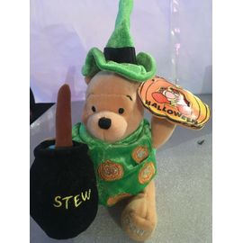 Peluche lumineuse verte winnie l'ourson halloween avec chaudron - disney - disney store