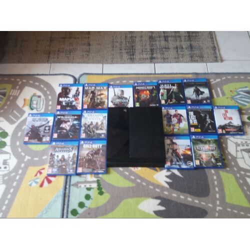 Ps4 500go + 12 Jeux + 1 Manette Sony + Un Casque A File