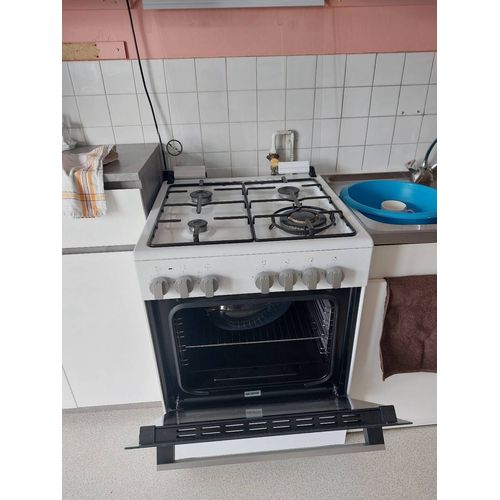 Gaziniere au gaz et four grill électrique