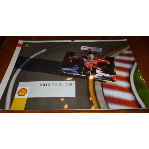 Grand Calendrier  Publicitaire 2012  Ferrari   Technical Partner Scuderia Ferrari  -  13 Photos En Couleurs Sur Papier Glacé  - 60x 40cm Environ - Reliure Spirale En Métal ,Prévu Pour Être Suspendu