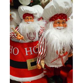 Père Noël cuisinier debout