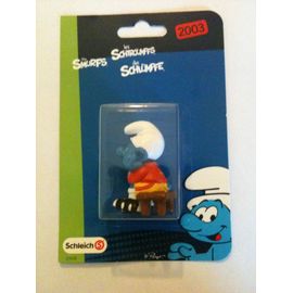 Figurine Schtroumpf sur le banc des remplaçants