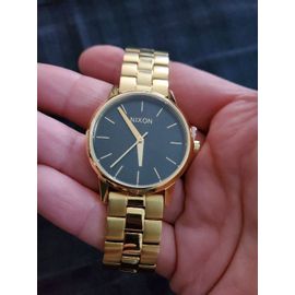 Nixon  Montre À Quartz En Acier Or Gold Doré Fond Noir 3.2 Cm