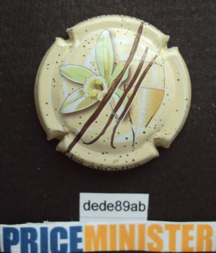 Capsule De Champagne Générique . Les Arômes : Vanille , Texte Au Verso.