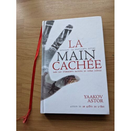 La Main Cachée