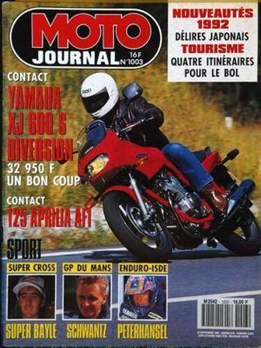Moto Journal N° 1003 Du 12/09/1991 - Contact : Yamaha Xj 600 S. Diversion. 32 950 F. Un Bon Coup. Contact : 125 Aprilia Afi. Sport : Super Cross, Super Bayle. Gp Du Mans, Schwantz. Enduro-Isde, Peterhansel. Nouveautes 1992 : Delires Japonais. Tour...