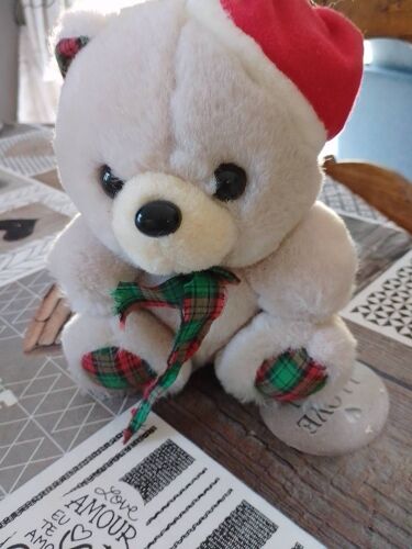 Ours Beige Assis Petit Noeud Et Bonnet