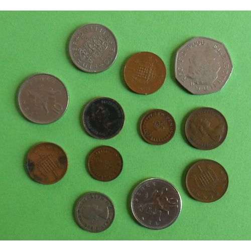 Lot De 12 Pièces De Monnaie Grande-Bretagne. 1/2 Penny 1971, 1/2 Penny 1976, 1 Penny 1971 (X 4), 1 Penny 1994, 6 Pence 1960, 10 Pence 1992 (X 2), 50 Pence 2006 Et 1 Schilling 1963.