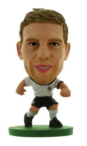 Soccerstarz - 400382 - Figurine Sport - Per Mertesacker Dans Sa Tenue D'équipe D'allemagne À Domicile